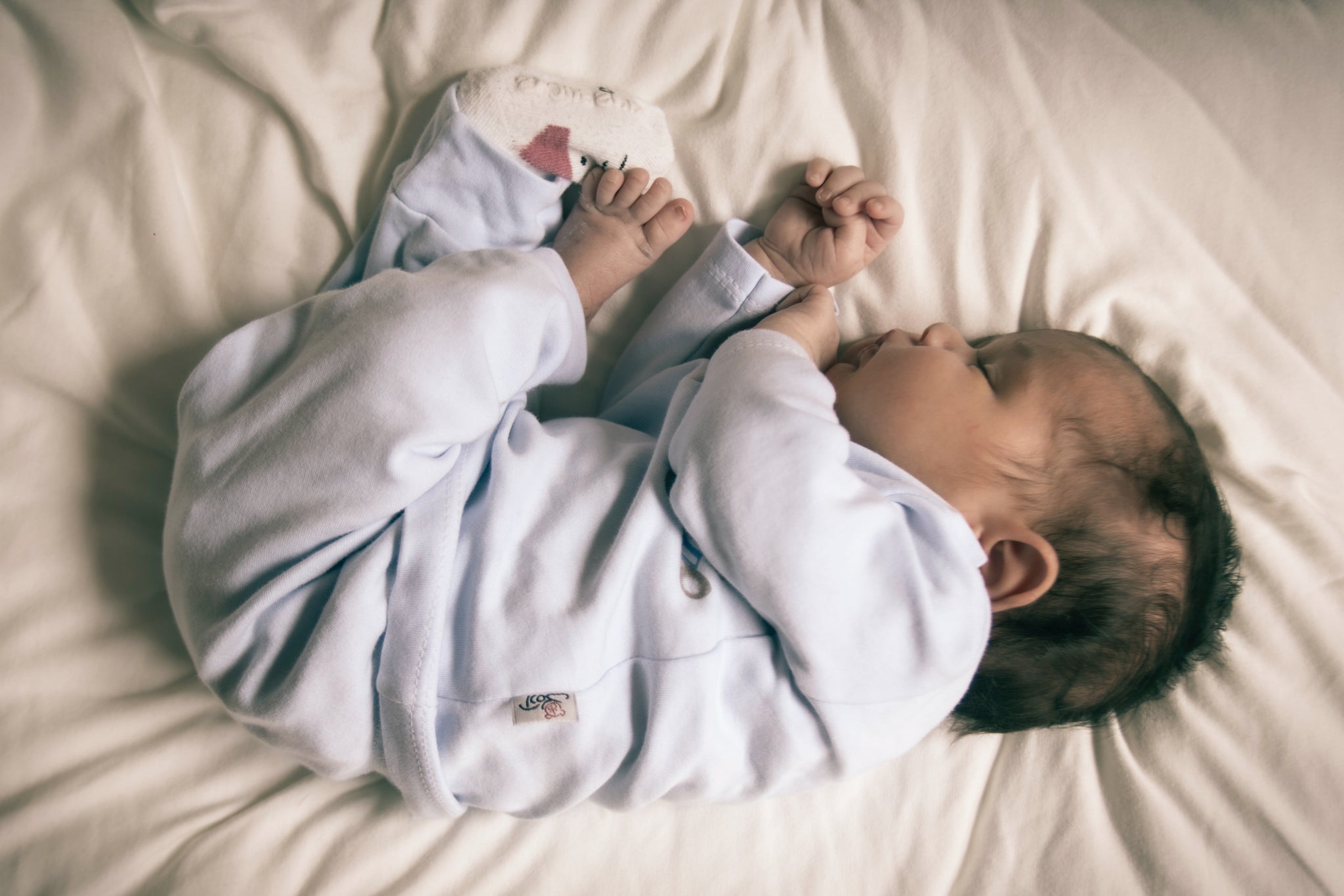 How to Transition From Sleep Sack to Blanket